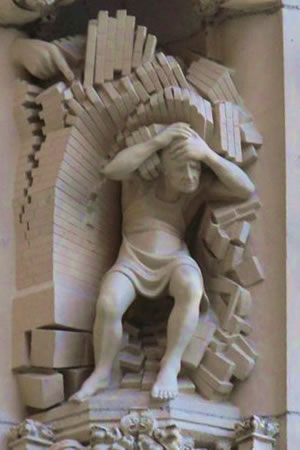 Statue covering his head